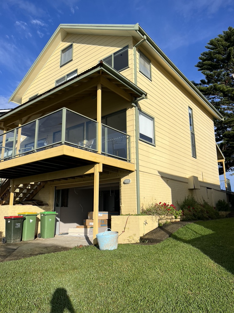 Exterior and outdoor decks at the Copacabana renovation by Halo Building Projects
