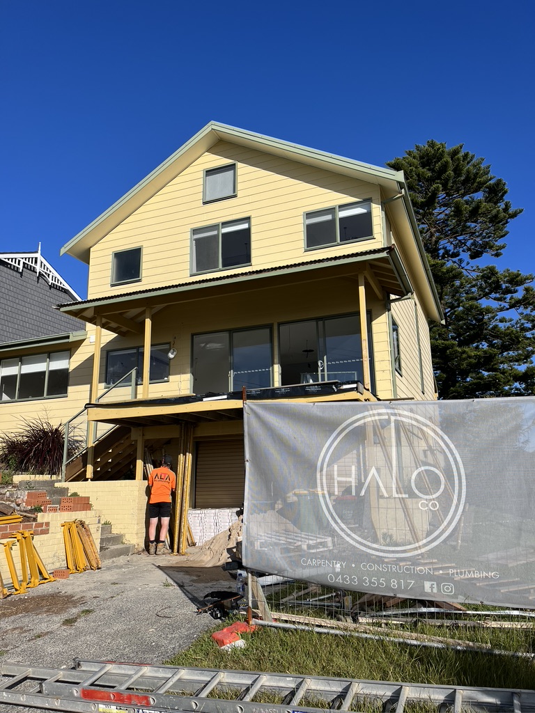 Exterior during building works at the Copacabana renovation by Halo Building Projects