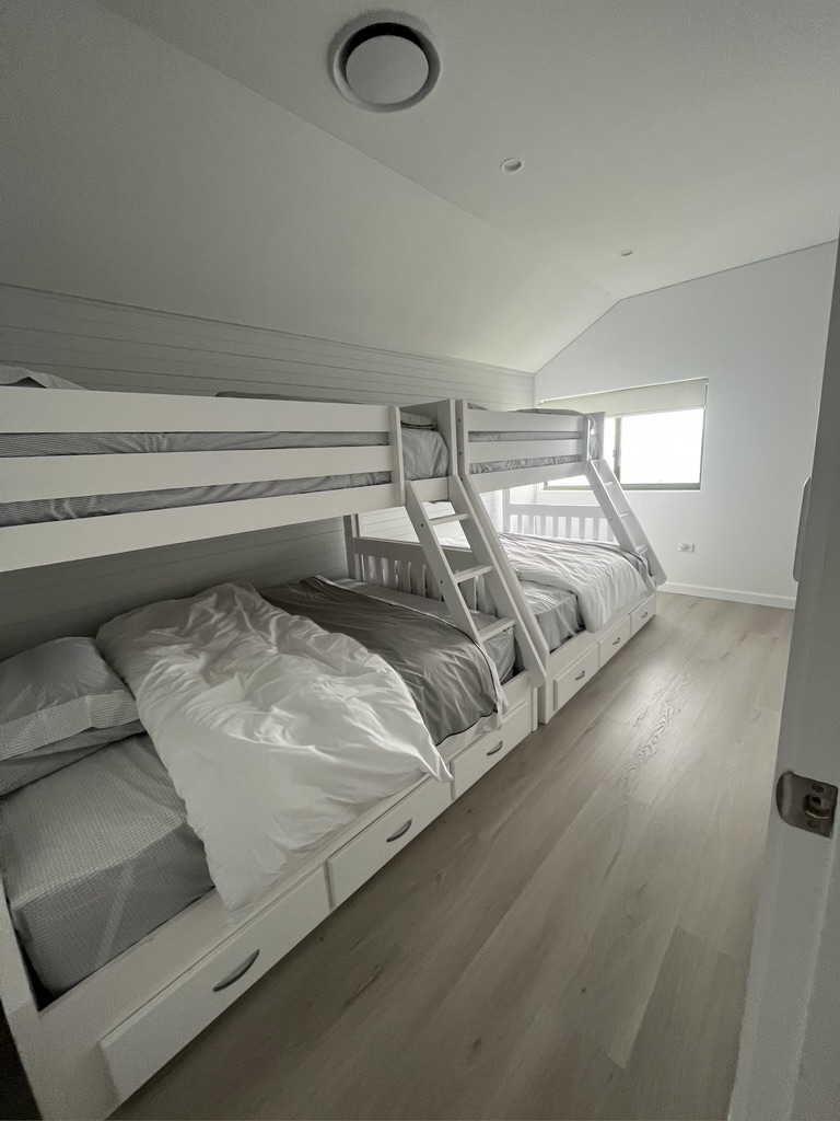 Upstairs bedroom at the Copacabana renovation by Halo Building Projects