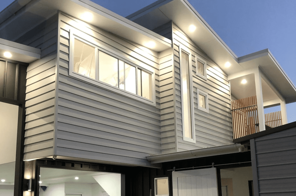 Exterior of a weatherboard home with an extended living area